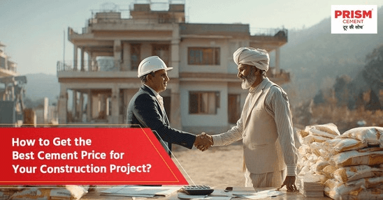 Men shaking hands at a construction site with cement bags