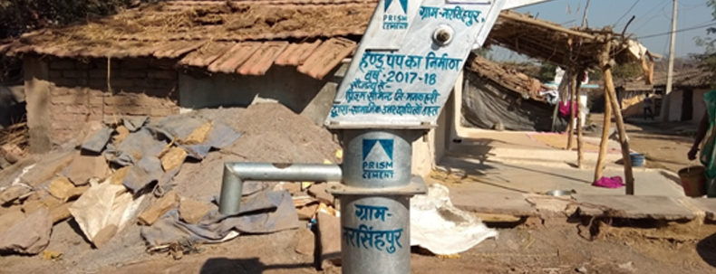 Hand pump installed by Prism Cement in a rural Indian village to provide clean drinking water