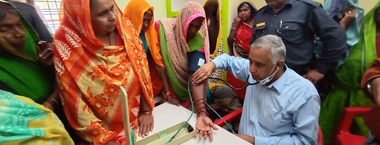 Prism Cement conducting free health checkup for women during a rural medical camp
