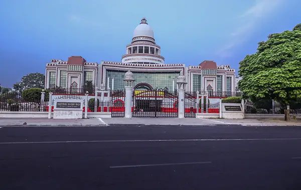 Front view of a luxury banquet hall with grand dome architecture and decorative entrance