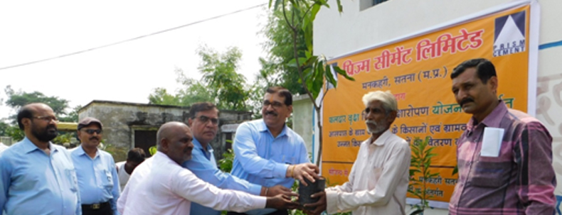 Prism Cement Limited officials and local farmers participating in a tree plantation event