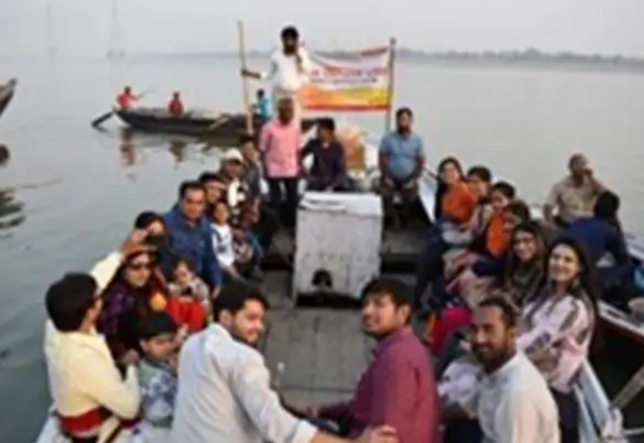 Prism Johnson team and families enjoying a group outing on a river boat
