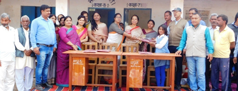 Group of people during a school event supporting education in rural India